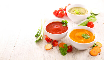 assorted of bowl of soup with fresh ingredients