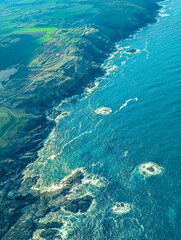An Aircraft Flies Past Just One Section Of The Beautiful Scottish Coast