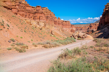 Charyn Canyon, Valley of Castles. The excellence of Kazakhstan. Panorama of natural unusual landscape. The red canyon of extraordinary beauty looks like a Martian landscape.