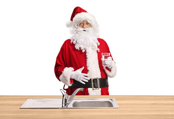 Santa claus drinking a glass of tap water