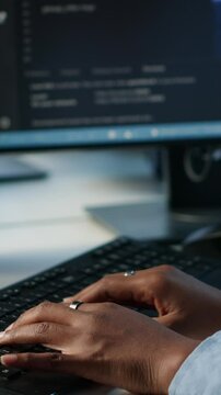 Data center admin using PC to find misconfigurations affecting rackmounts performance. Person checking servers bottlenecks leading to sluggish data transfer rates and malfunctions, camera A close up