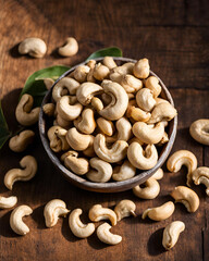 tasty, cashew bowl, nature background, beautiful, healthy snack, outdoor setting, fresh cashews, nuts, scenic view, natural light, vibrant colors, wholesome, protein-rich, raw cashews, vegan, vegetari