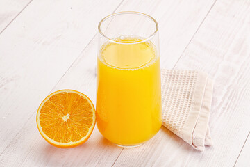Sweet fresh orange juice in the glass