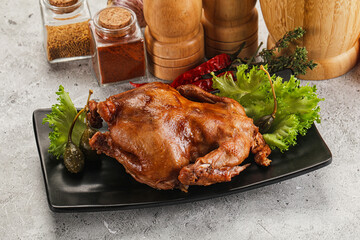 Baked small chicken with spices