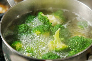 Vibrant broccoli to a bubbling pot of boiling water, creating a flavorful masterpiece.