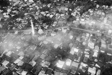 monochrome aerial view of cloudy village