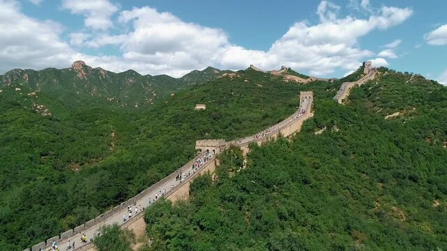 Aerial drone view of Badaling Great Wall of China.&nbsp;Great Wall Of China drone video. Great Wall Of China in summer. Green trees around the great wall of china.