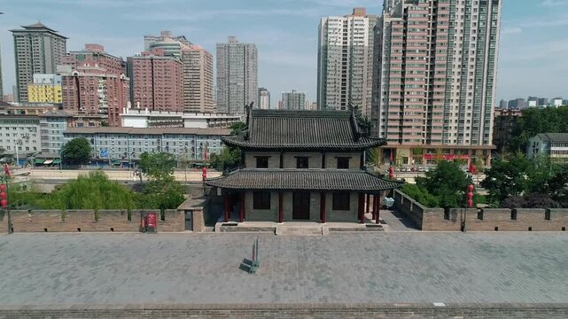 Aerial drone view of ancient city wall in Xian. Xian in China panorama from drone. Xian old town in China Asia. Fortifications of Xian City Wall.