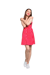 Full size photo of charming lady closing eyes wearing polka dot dress skirt isolated over teal turquoise background