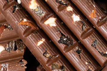 Close-up of milk nut chocolate. Healthy sweets, lactose-free and sugar-free chocolate