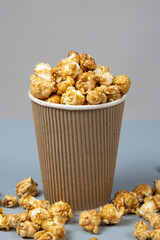 Sweet caramelized popcorn in a bucket.