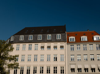 Beautiful old white house with large windows. Scandinavian style. Architecture in the capital