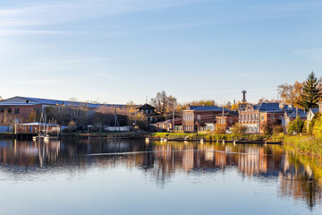 Bogorodsk, Nizhny Novgorod region, Russia, Street view of an ancient provincial Russian city on the shore of a lake on a summer evening. An ancient building of artisans, an architectural monument.