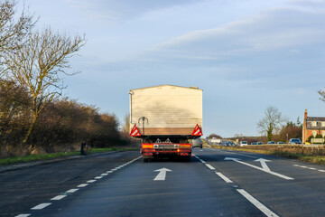 A Lorry Carrying A Static Caravan Home To It's Next Location And New Customer