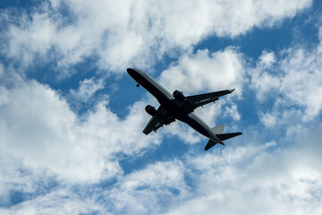 A Large Passenger Aircraft Passing Overhead