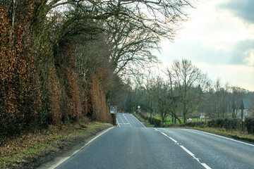 Fototapeta premium Long Country Road In The Lands Of The United Kingdom
