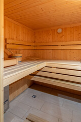 Small home sauna finished with wood.