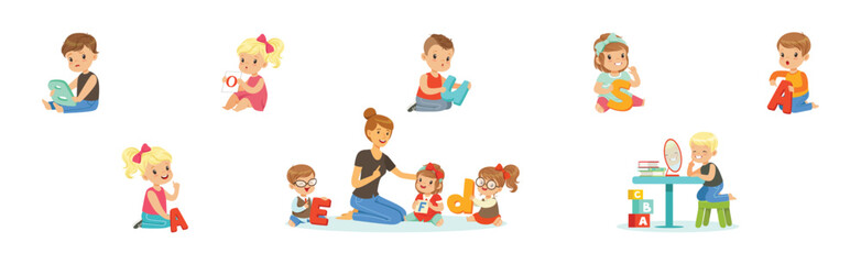 Preschool Boy and Girl Sitting on the Floor with Alphabet Letter Vector Set
