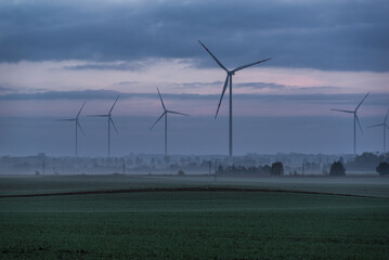 WIND FARM - Colorful sunrise over windmills 