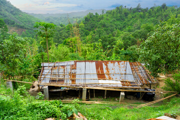 Tribal house on the hill. Pictures of Sundarbans, a mountainous region of Bangladesh.