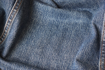 Fototapeta premium seam of blue denim texture background, jean fashion style