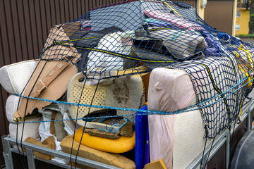 Bulky waste from a household clearance on a trailer