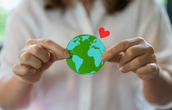 Hands holding earth globe environmental conservation, sustainability, eco-friendly concept, protecting planet, global responsibility, environmental awareness, climate action, earth care, saving nature