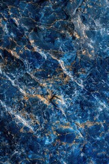 Obraz premium A close-up view of a blue marble surface with intricate patterns and textures