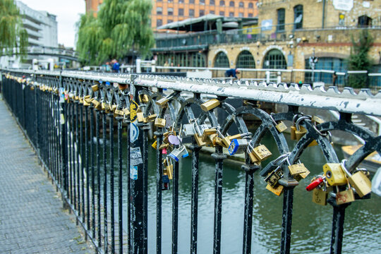 Padlocks All Locked Up And Left On A Metal Fenceline