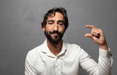 holding an object ,showing, offering or advertising something small