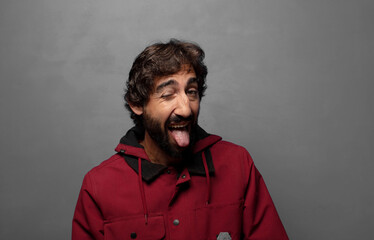 with cheerful, carefree, rebellious attitude, joking and sticking tongue out, having fun
