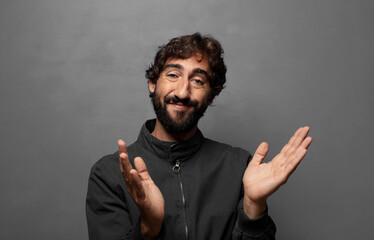 feeling happy and successful, smiling and clapping hands, saying congratulations with an applause