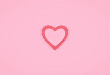 Heart paper cutout on soft pink background with crisp edges and delicate handcrafted appearance. For romantic, Valentine&rsquo;s Day, wedding-themed designs and creative projects with warm, loving aesthetic