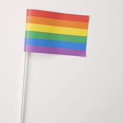 Fototapeta premium Vibrant rainbow flag design created with soft pastels on a pure white backdrop symbolizing support for LGBT LGBTQ communities during Pride Month and the International Day Against Homophobia