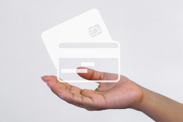 A person's hand holding a credit card. Economy concept.