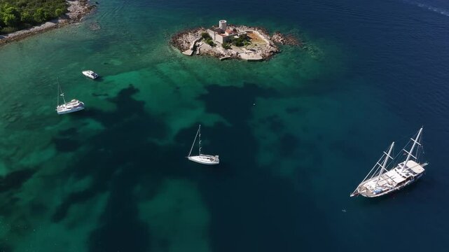 Aerial view of of Otocic Gospa island with an Orthodox church, Kotor Bay, Montenegro