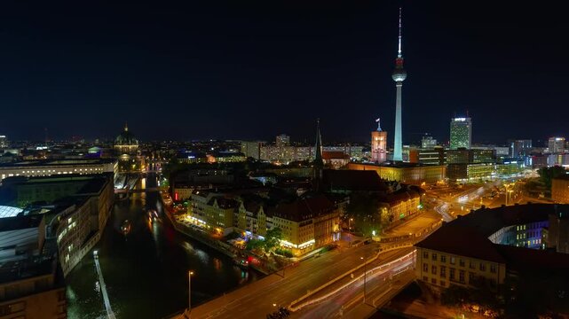 BERLIN, GERMANY - OCTOBER 28, 2024: Berlin TL showcases stunning city lights and landmarks at night over a busy urban landscape