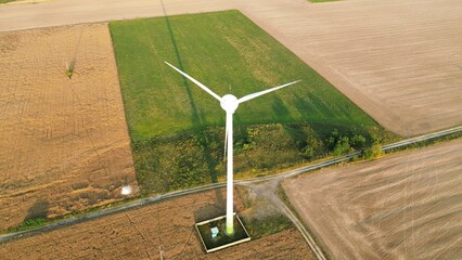 Drone shot of wind turbines in a rural landscape