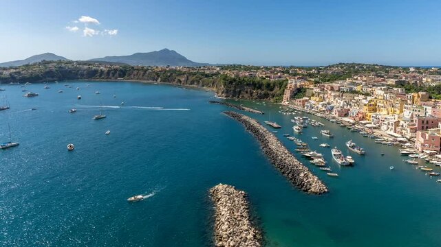 Time lapse of Marina di Corricella and Santa Maria delle Grazie Church, Procida, Phlegraean Islands, Gulf of Naples, Campania, Southern Italy, Italy