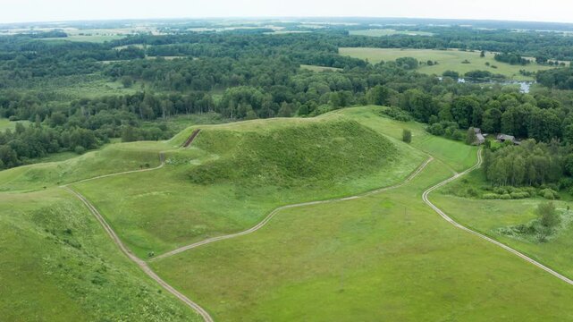 Aerial view of Medvegalis mound in Silale district municipality. Medvegalis was a 14th-century fortress in Samogitia (zemaitija). Lithuania - 2024 Aug 15. 