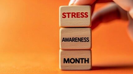 Stress awareness month symbol. Wooden blocks with words 'Stress awareness month'. Beautiful white background