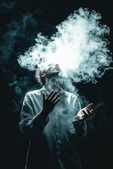 Obraz premium A man engulfed in swirling smoke, creating an ethereal and mystical atmosphere with light and shadows interplay.