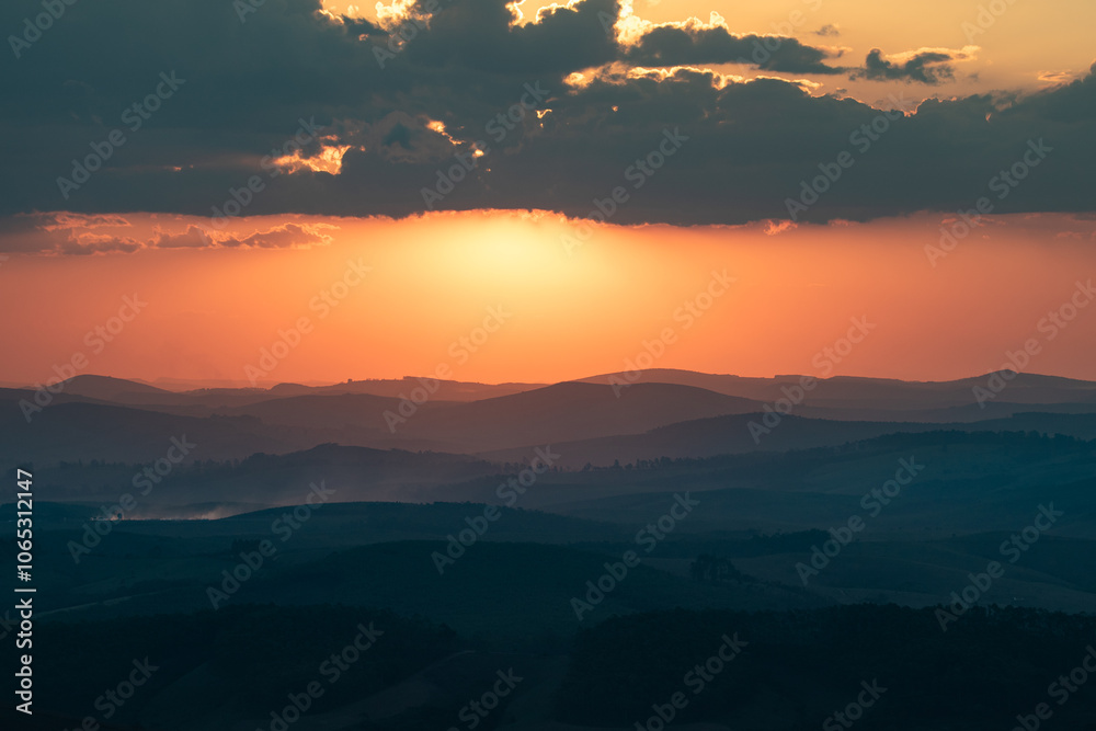 Sticker sunset over the mountains