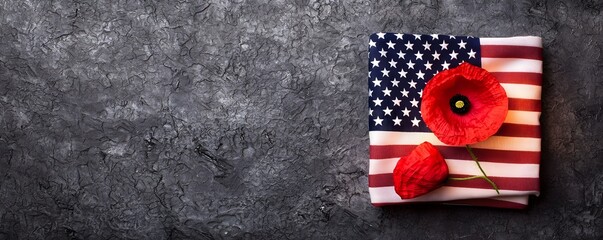 Obraz premium Patriotic Tribute Illuminated American Flag with Red Poppy Flower - A Heartfelt Symbol of Reverence and Freedom in Soft Warm Light