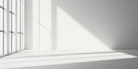 Obraz premium Minimalist bright white background with soft shadows from window light, perfect for elegant and clean presentations or product displays