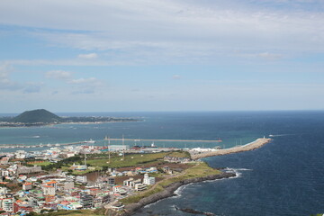 Fototapeta premium Cityscape view from the hillside on Jeju Island Korea