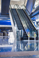 Escalator room with glass