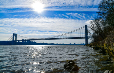 View of the river and the metal George Washington Bridge, New York USA