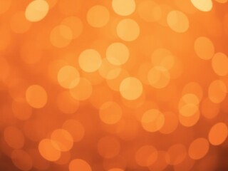 Abstract orange bokeh background with sparkling lights and soft focus, festive