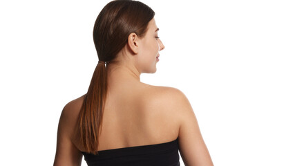 Fototapeta premium Rear view photo of female model in black top posing demonstrate her posture and healthy back against white background. Concept of beauty, healthcare, freshness and wellness, confidence. Ad